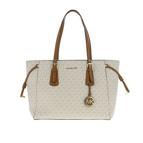 michael kors tote luggage color with cream handles|michael kors luggage sets clearance.